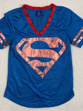 DC Comics Blue Short Sleeve Tee with Rose-Gold Superman Emblem and Red Trim